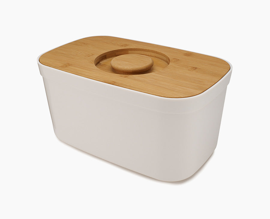 Joseph Joseph 81097 · Panera blanca con tapa de bambú y asa circular