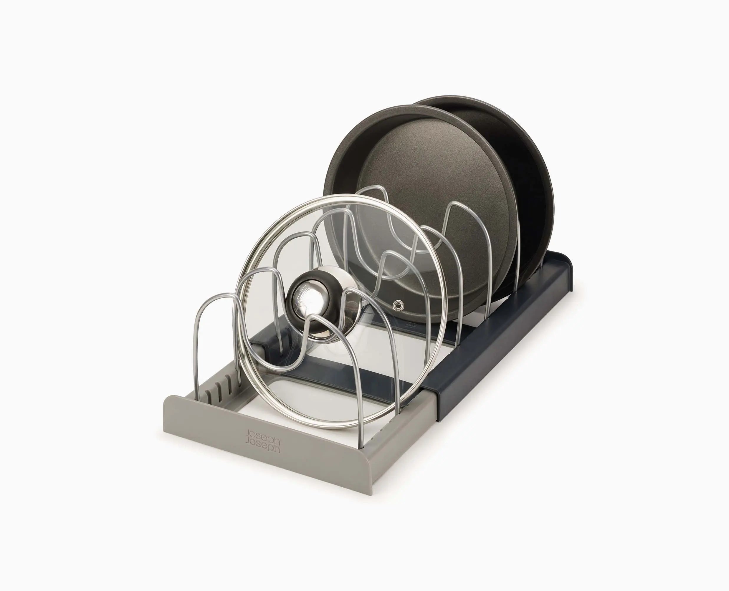 Joseph Joseph 85167. Organizer estensibile grigio per pentolame, con divisori, coperchi e stampi illustrativi.